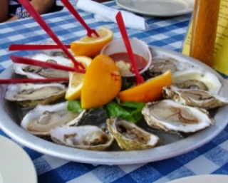 photo fresh seafood, one of the most delicious of the Cape Cod attractions are oysters on the half shell