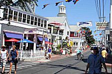 photo of busy Commercial Street in Provincetown camping nearby there are many restaraunts and shops to choose from 